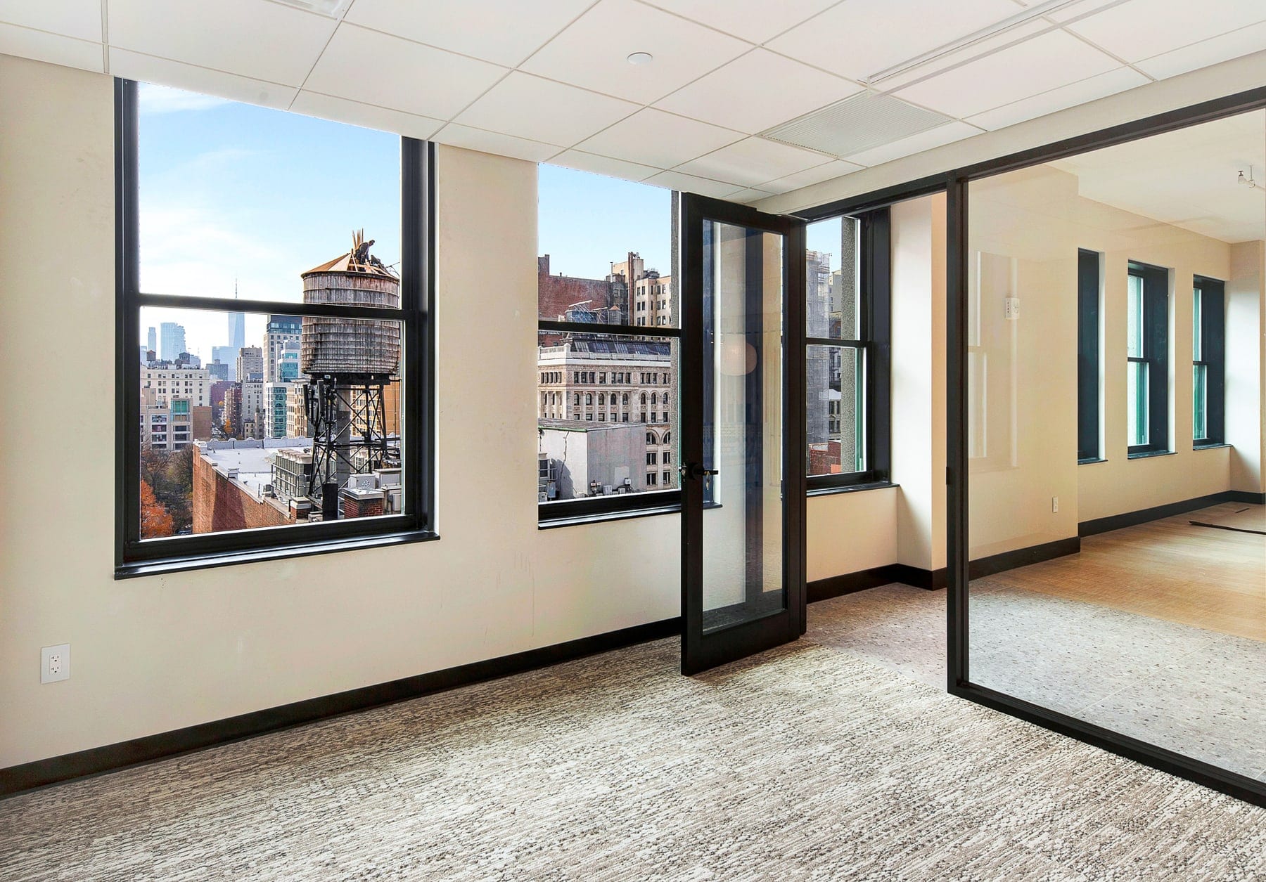An empty room with the watertower view, as shot
